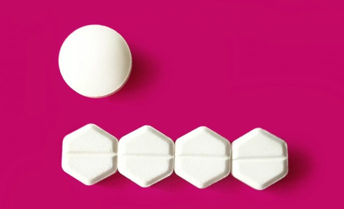 → Medical abortion pills on pink background